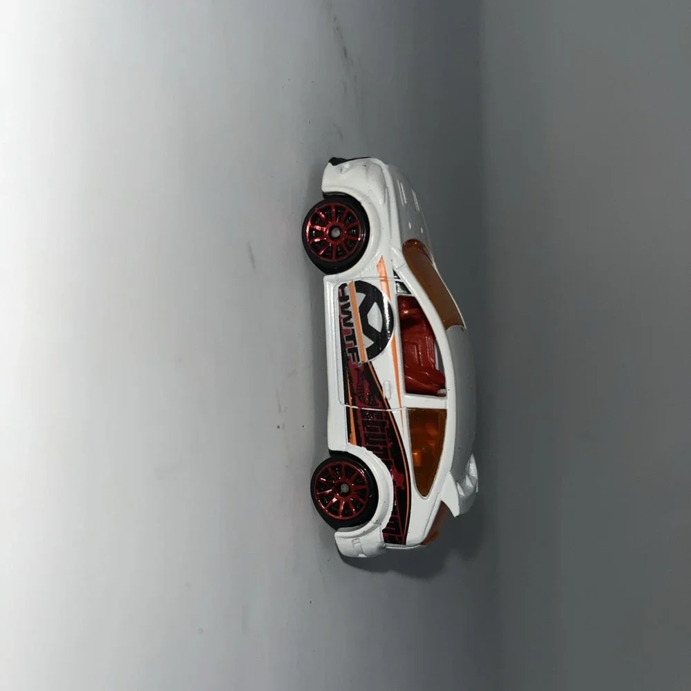 Hot Wheels '09 Ford Focus RS 2010 HWTF White/Red/Orange Windows Loose Diecast